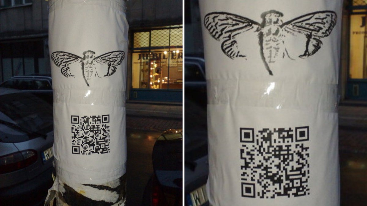 Posters físicos com QR codes colados em postes