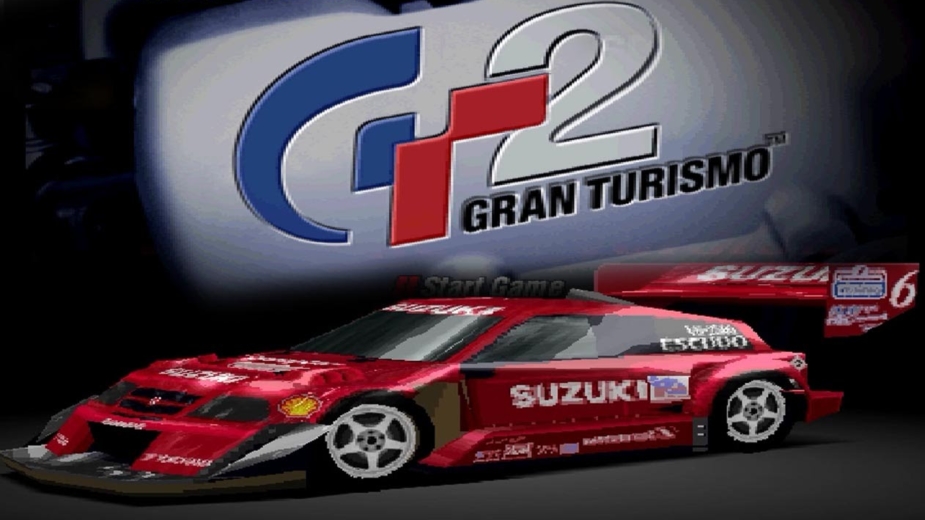 Carro vermelho Suzuki Escudo Pikes Peak com aerofólios enormes do jogo Gran Turismo 2